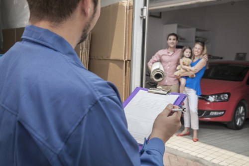 Office relocation planning in Eastfinchley with packed boxes and office equipment