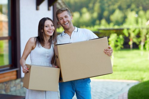 Local man and van team handling household items in East Finchley