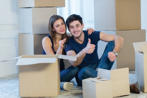 Loading furniture into a removal van in Eastfinchley