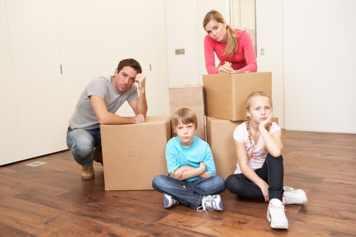 Packing boxes and furniture for a home removal service in Eastfinchley